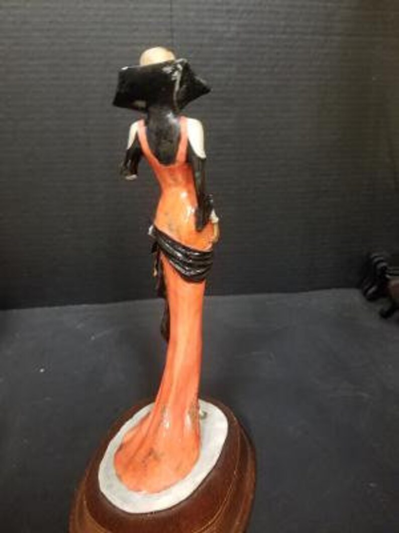 Signed 105 by 6 by 4.5 Vintage Leonardo Collection Lady in Red Posing