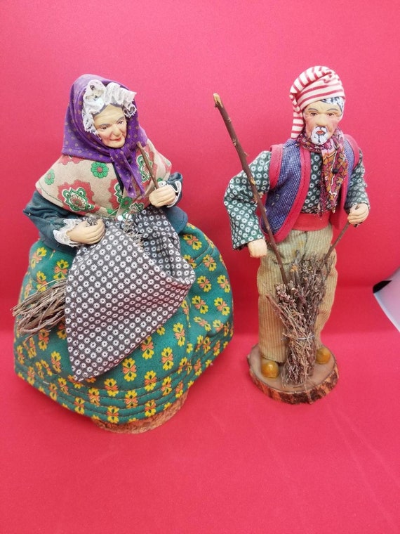 old man and woman ceramic dolls