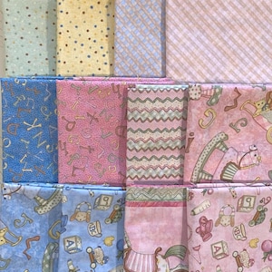 May include: A collection of various fabric swatches in pastel colors. Patterns include polka dots, diagonal stripes, and alphabet letters. Some fabrics feature rocking horses and baby-themed illustrations. Ideal for quilting or baby projects.