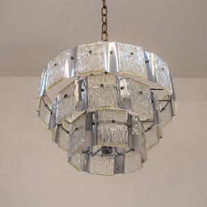 Steel and glass chandelier, Italy, 70s.