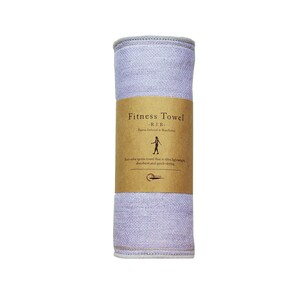 May include: A rolled up purple fitness towel with a brown label that reads "Fitness Towel -R.I.B- Rayne Infused with Binchotan Anti odor sports towel that is ultra lightweight, absorbent and quick-drying."