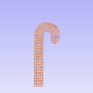 May include: A brown wooden candy cane ornament with a decorative pattern of small holes. The ornament is a traditional Christmas decoration.