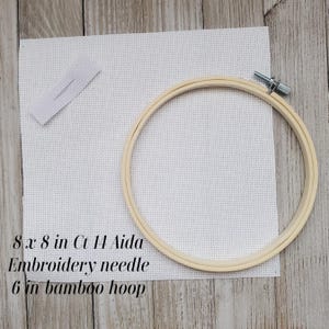 May include: An 8x8 inch piece of white 14 count Aida cloth, a 6 inch bamboo embroidery hoop, and an embroidery needle.