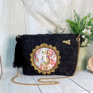 black velvet baguette bag with Sicilian swordsman design, shoulder bag with Sicilian style chain
