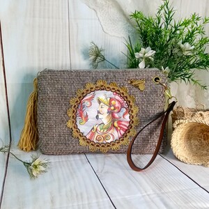 beige velvet wrist clutch , with Sicilian swordsman design, side tassel and faux leather handle , women's birthday gift