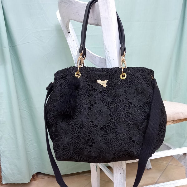 borsa in pizzo nero siciliano , con manici in ecopelle e tracolla , borsa capiente ed elegante