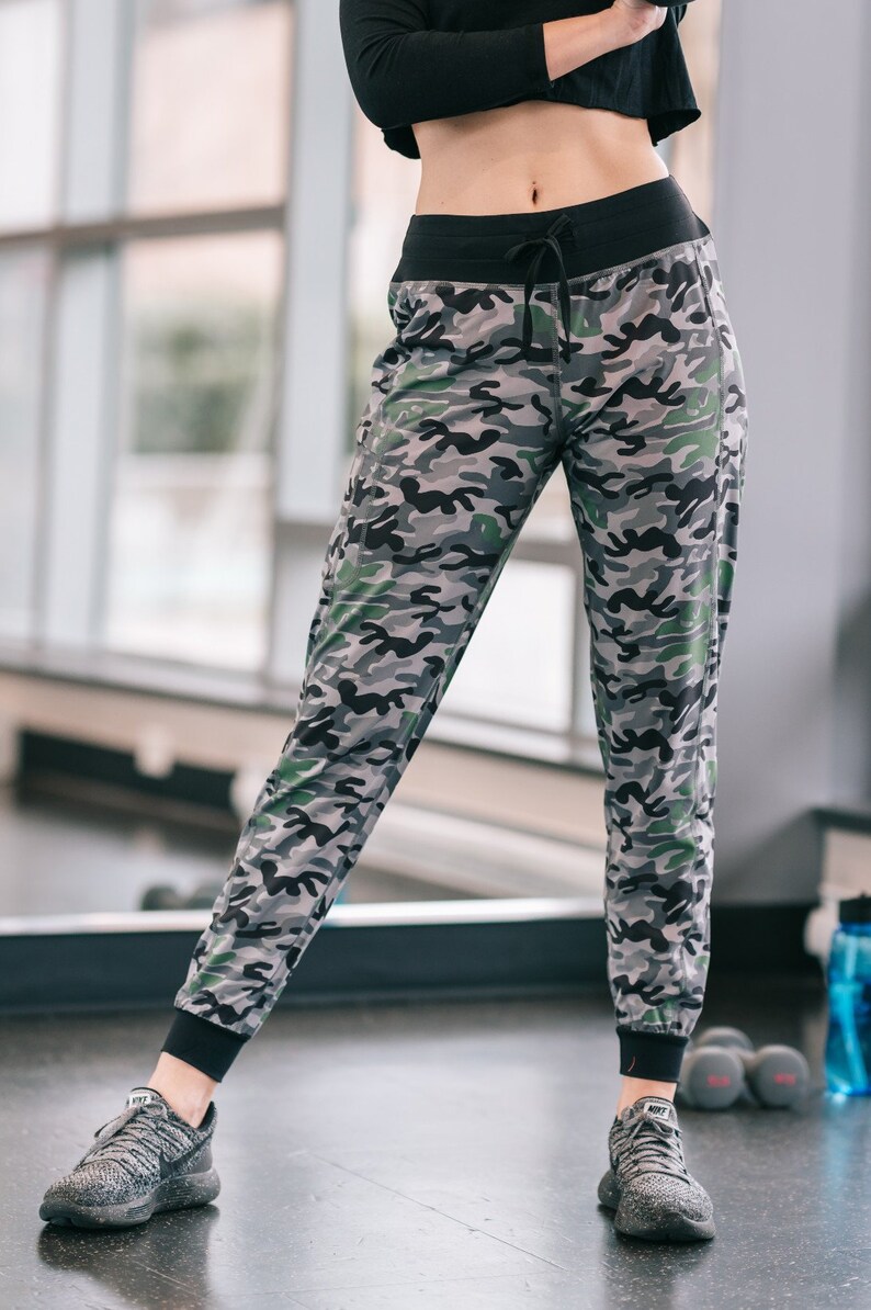 Stella Zippered pocket on right leg drawstring elastic waist cuffed bottom made from lightweight fabric