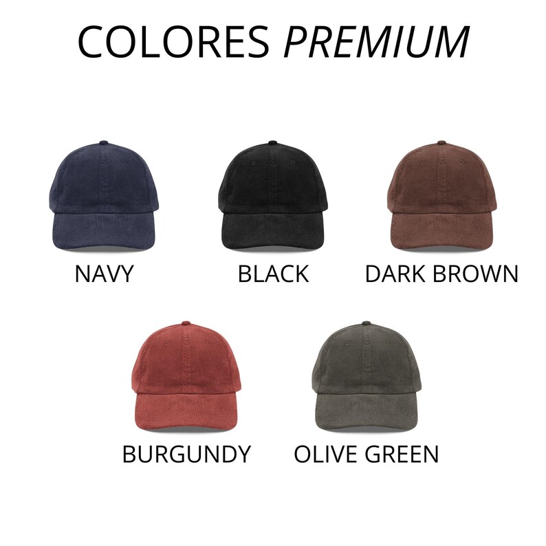 May include: Five corduroy baseball caps in navy, black, dark brown, burgundy, and olive green. The text "COLORES PREMIUM" is at the top, with the color names below each cap. These caps are a stylish accessory.