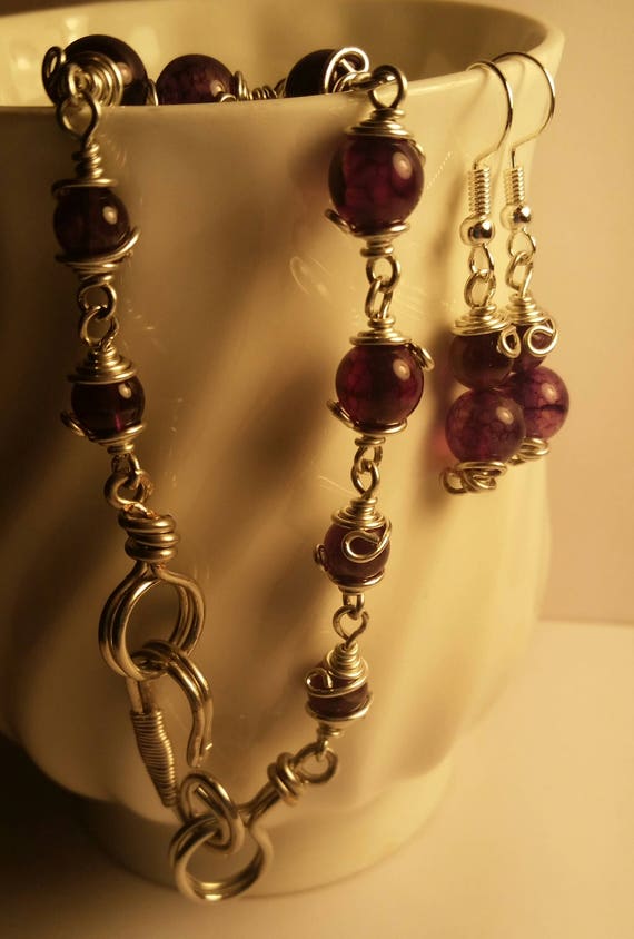 Purple Swirl Glass Beads 8 in. Bracelet, and Purple Drop Dangle Wire Earring Set