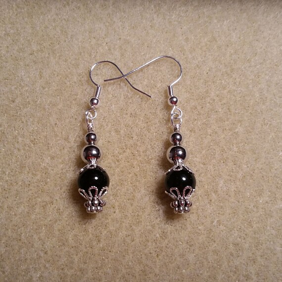 Silver capped Black glass bead earrings
