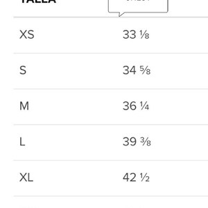K&ouml;nnte beinhalten: Gr&ouml;&szlig;entabelle mit Brustumfang in Zoll und Zentimetern. Die Tabelle umfasst die Gr&ouml;&szlig;en XS, S, M, L, XL, 2XL und 3XL.