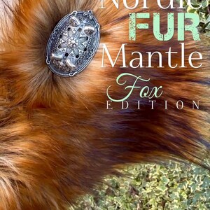 May include: A close-up of a red fox fur mantle with a silver metal clasp. The text "Nordic Fur Mantle Fox Edition" is superimposed on the image.