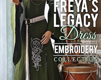 May include: A green dress with long sleeves and intricate white embroidery, displayed on a mannequin. The dress features a belt, shoulder details, and a split skirt. The text "FREYA'S LEGACY Dress EMBROIDERY COLLECTION" is visible.