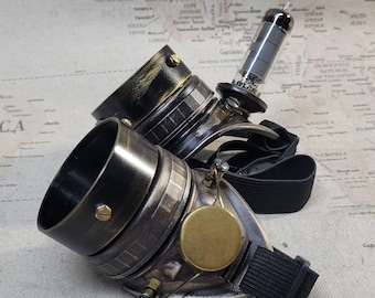Aged Brown Steampunk Engineer Goggles With Black Extension Rings and a Vacuum Tube