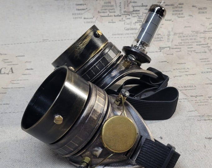 Aged Brown Steampunk Engineer Goggles With Black Extension Rings and a Vacuum Tube