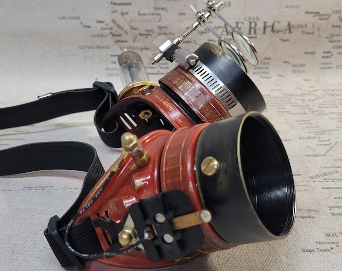 Aged Red/Gold Steampunk Engineer Goggles With Red Lenses, A Vacuum Tube, and Double Loupes