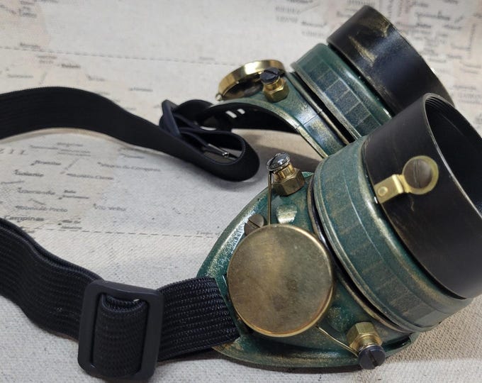 Aged Green/Gold Steampunk Engineer Goggles With Black Extension Rings