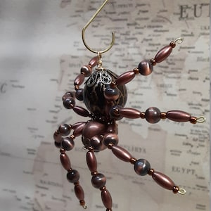 Araña de cobre con cuentas Steampunk metálicas