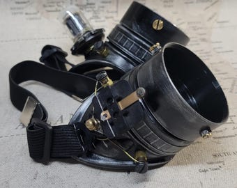 Aged Black/Silver Steampunk Engineer Goggles With Black Extension Rings and a Vacuum Tube