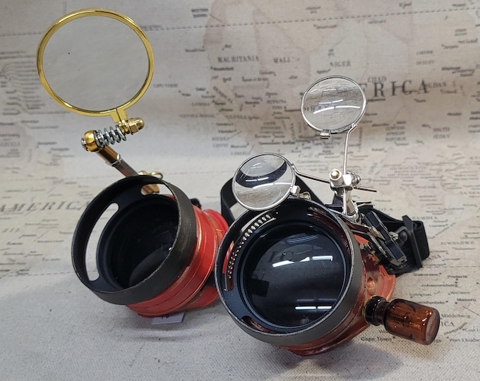 Aged Red/Gold Steampunk Engineer Goggles With a Large Magnifying Loupe and Double Loupes