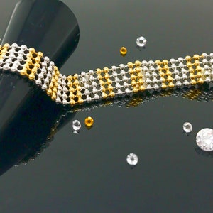 Lebendiges, modernes Mix Weißgold und Gelbgold Kettenarmband