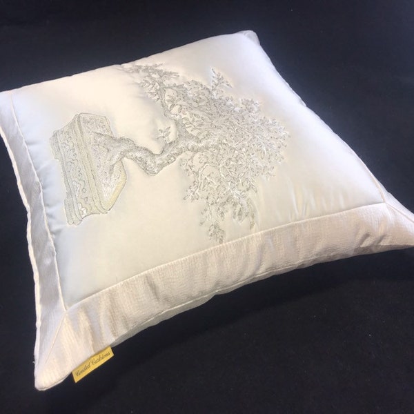 Quilted ivory silk cushion with satin  back with ivory satin border outline quilted silk