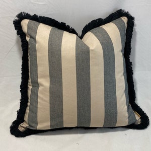 Black/Taupe striped cotton fabric cushions with black floppy, soft, bushy fringe