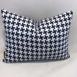 Outdoor poolside cushions in navy and white checkered pattern
