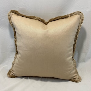 Sand colour  natural linen twill fabric cushions  with matching cut fringe trim
