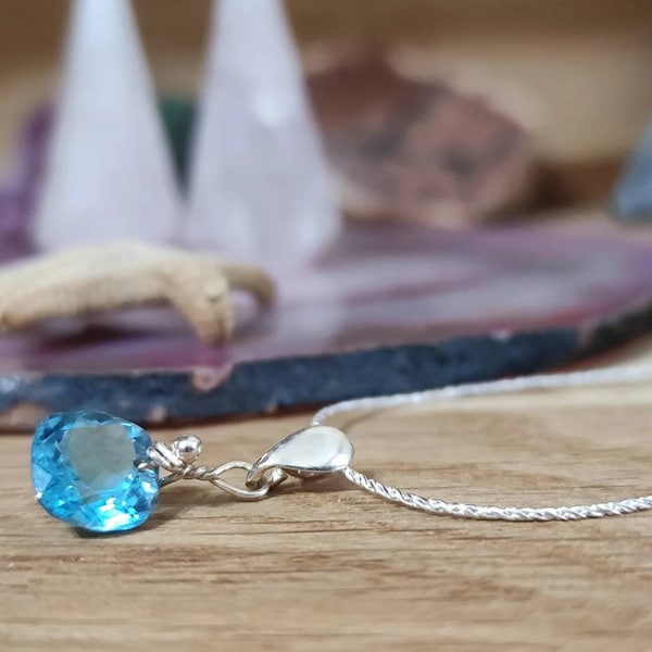 Blue square faceted topaz with silver string 50ctms