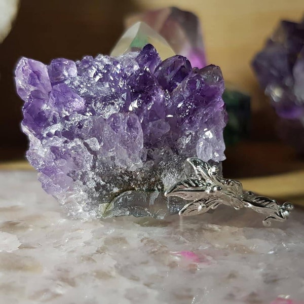 Beautiful raw druzy cluster of Amethyst from Uruguay set in 925 silver asymmetric branch clamp.. 40x35mm