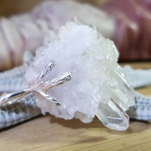 Raw natural crystal quartz with bi-finished tips set in asymmetrical branch of silver 925 sterlin..