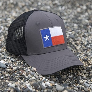 International Tie Texas Black Flag Hat: Adjustable Trucker Baseball Hat with an Embroidered Patch