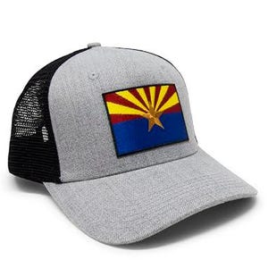 May include: A gray and black trucker hat with a patch of the Arizona state flag on the front.