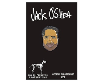 May include: Enamel pin featuring a cartoon illustration of a man's face with the name "Jack O'Shea" above. The pin is part of the "enamel pin collection #24" by Chris Fafalios Productions. A white skeletal dog illustration is also present.