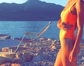 Orange swimsuit in sizes 36, 36 long, 38 (EU Women 39 s)