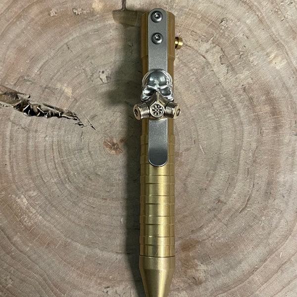 One handmade Titanium Clip with Skull with Mask for Boker 50 cal Pen.