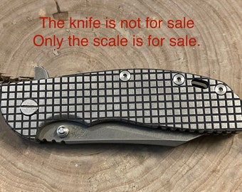 Handmade scales with custom "Frag" design for the Hinderer XM-24