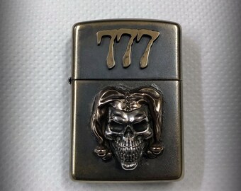 Lighter with custom  "Joker Skull" design.