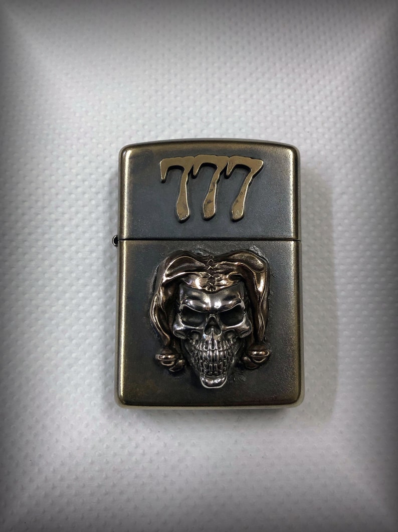 Zippo Lighter with custom Joker Skull design. Etsy