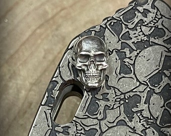 Custom Titanium and Silver Handle Hardware. One Titanium Handle Nut with Silver Skull for XM-18 3.5" Model.