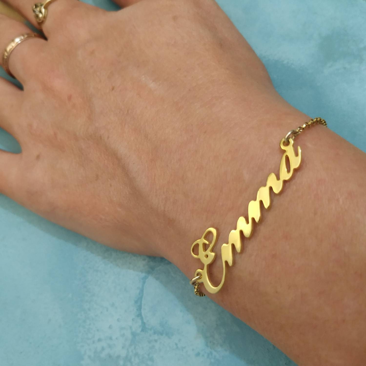 Gold bracelet shop name design