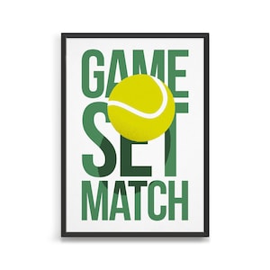 May include: A green and white poster with the words "GAME SET MATCH" in bold, green letters. A yellow tennis ball is centred in the poster, behind the word "SET".