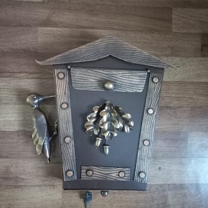Schmiedeeisen Briefkasten mit einem Specht