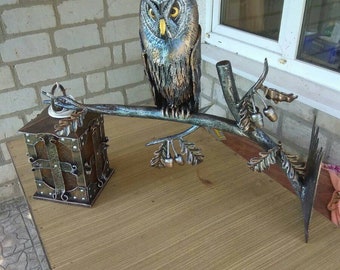 Forged lamp with owl, outdoor sculpture