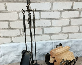 A set of fireplace tools and a stand for firewood, handmade
