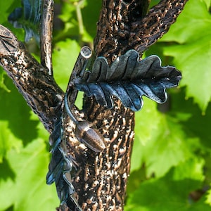 Wrought  branch, (a bracket for a sconce or for a flower pot.)