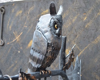 Forged lamp with owl, outdoor sculpture
