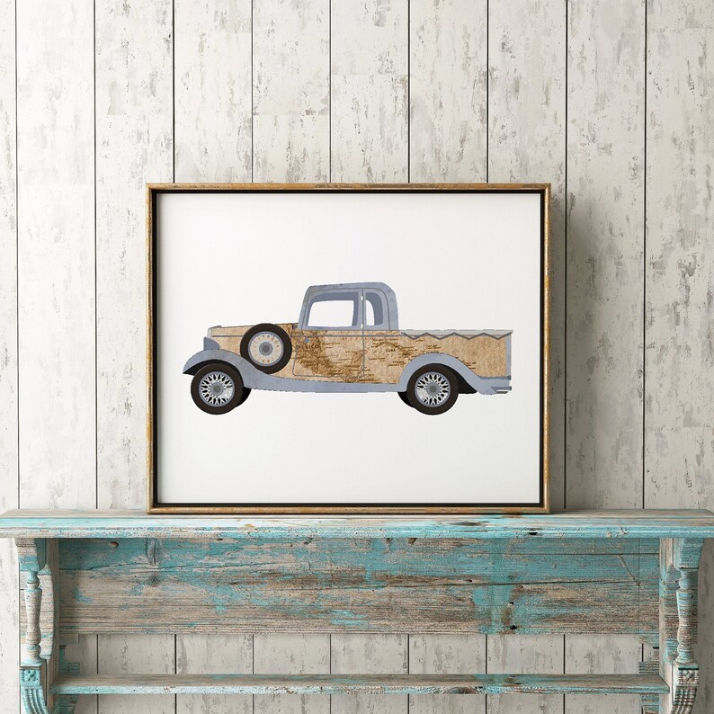 May include: A framed print of a vintage pickup truck with a light blue body and a brown wooden bed. The truck is on a white background.