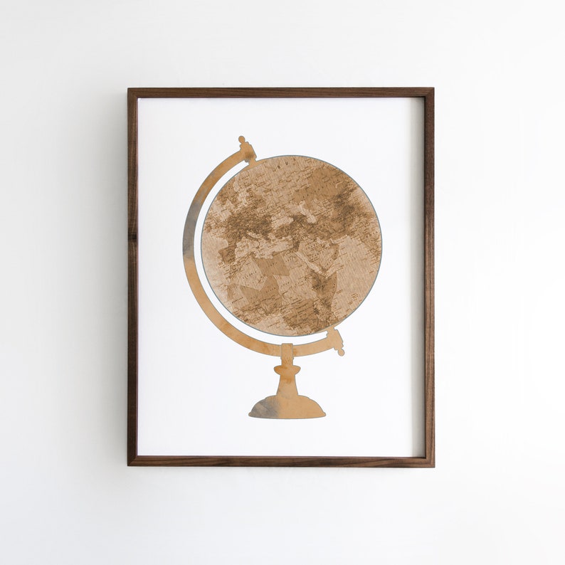 May include: A framed print of a brown and beige globe on a stand. The globe is a watercolor illustration of the world.